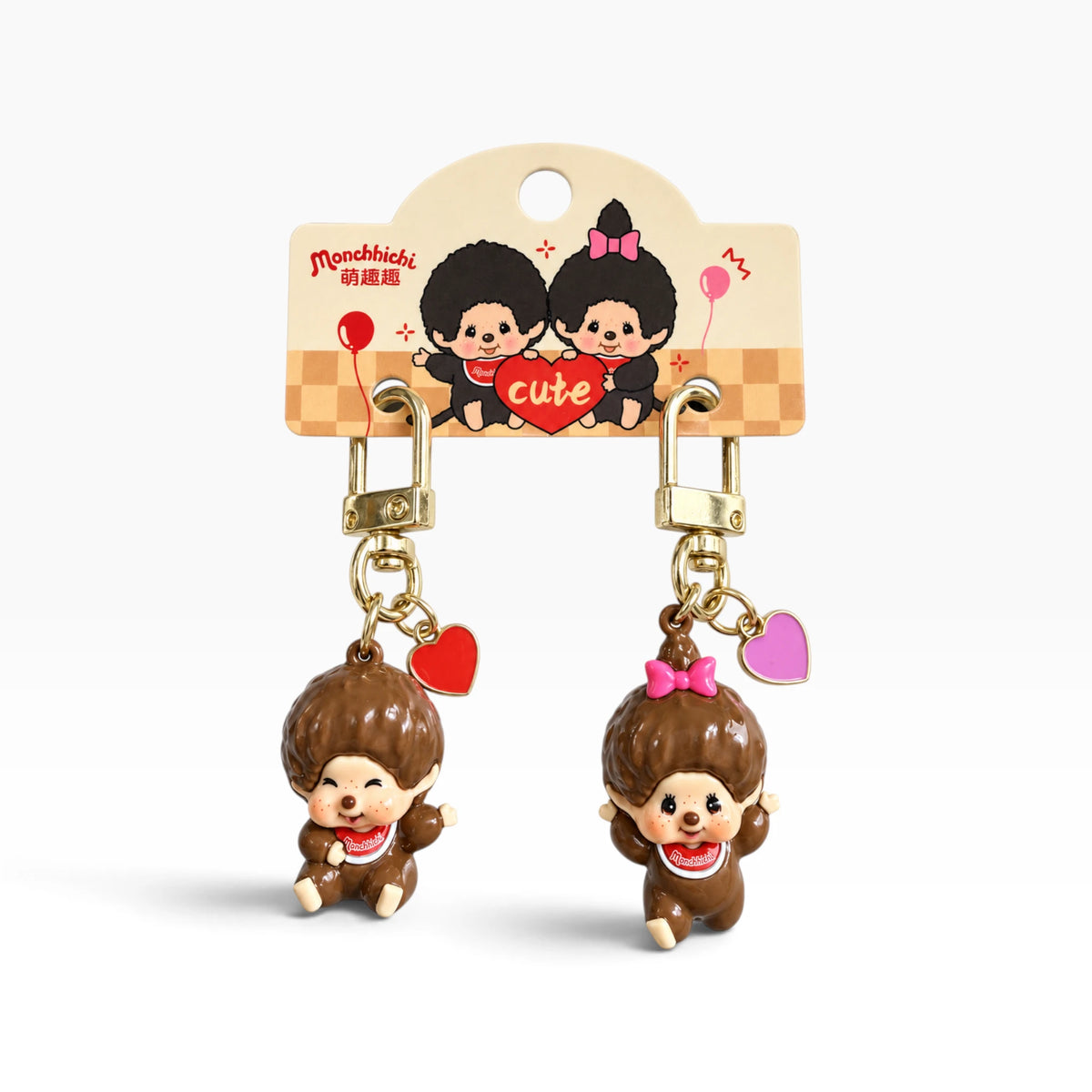 2-pack Monchhichi mini charms with gold clips and brown figure keychains, heart & bow accents