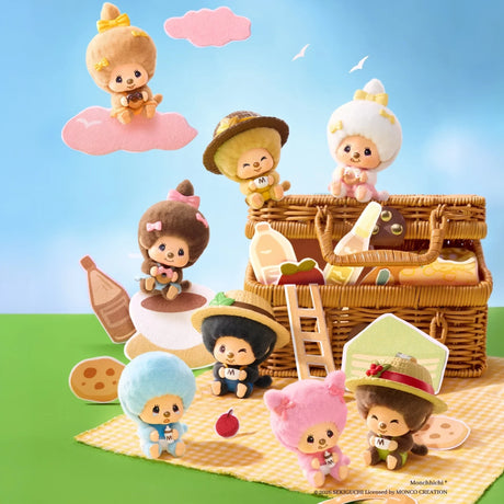 Wicker basket display with multiple Monchhichi pendant figures on a pastel mat