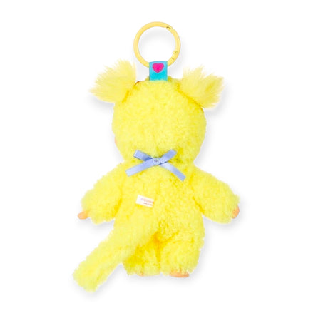 Yellow plush bag charm with heart tag, bow, and hanging loop