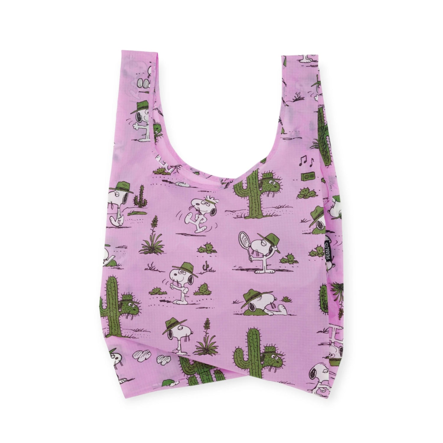 This charming pink reusable bag, part of the Peanuts x Baggu set of 3 Standard Bags - Floral Snoopy, is made from recycled nylon and showcases whimsical illustrations of cartoon animals in hats, playing tennis, and near cacti.