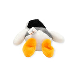 Plush penguin keychain with fabric tag, black top, white body, and orange feet
