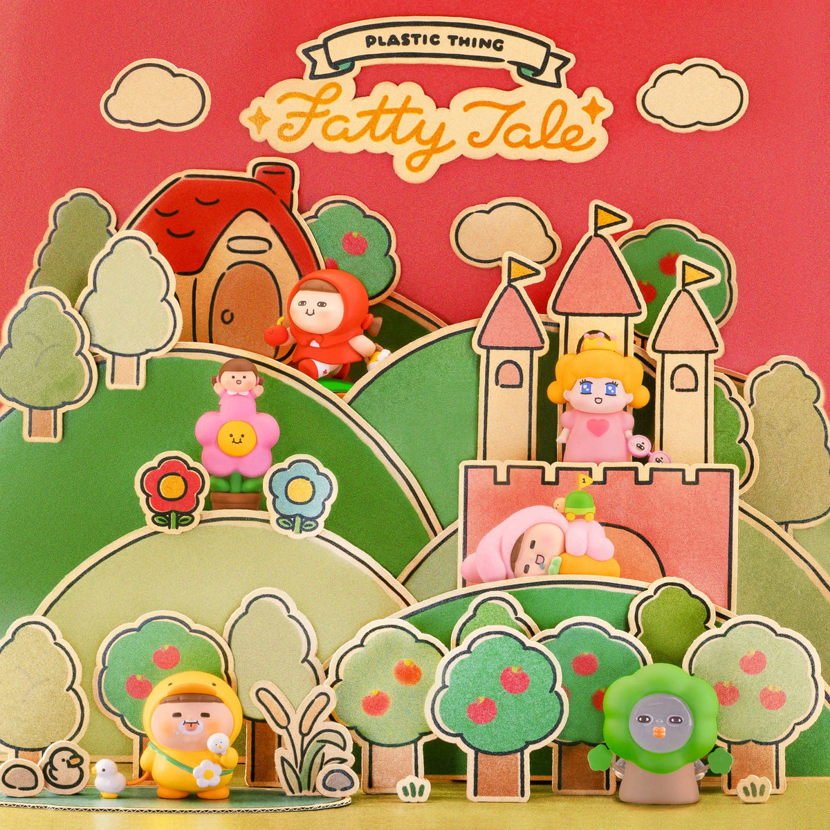 Blind box toy packaging with Fatty Tale cartoon characters, trees, and castle scene