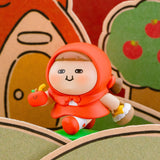 Orange hood blind-box figurine holding a small white bottle, with tiny red character.