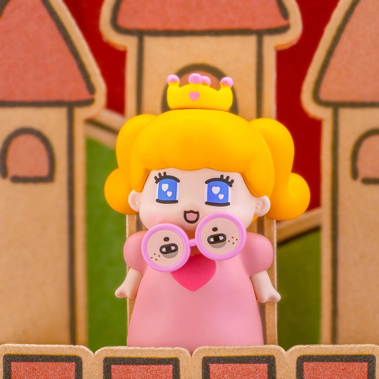 Blind-box figurine with orange hair, heart-shaped chest, and two-faced goggles.