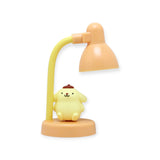Pompompurin Mini Night Light by Sanrio with yellow character figure and flexible peach lamp on round base