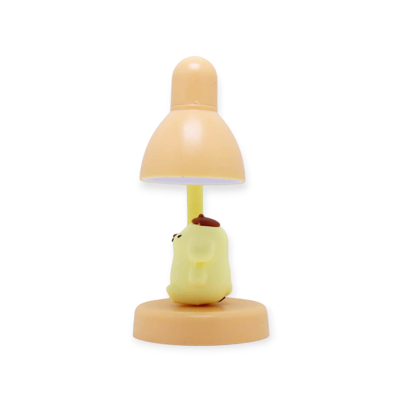 Pompompurin Mini Night Light by Sanrio with yellow character figure beneath peach-colored lamp on round base