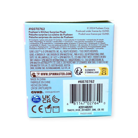 The back of a Pusheen Blind Box - Kitchen Surprise Series box presents product details, a barcode, and a QR code on a light blue background. This charming series by Pusheen includes adorable mini plushies to collect and enjoy.