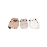 The Pusheen Family - Plushie Gift Set includes three plush toy cats in brown, gray, and white featuring embroidered faces and small ears. Ideal for family gatherings or as cozy home decor.