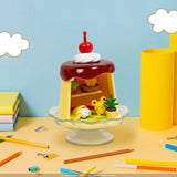 Cherry-topped mini dessert blind box lantern with yellow cat and pudding on pedestal