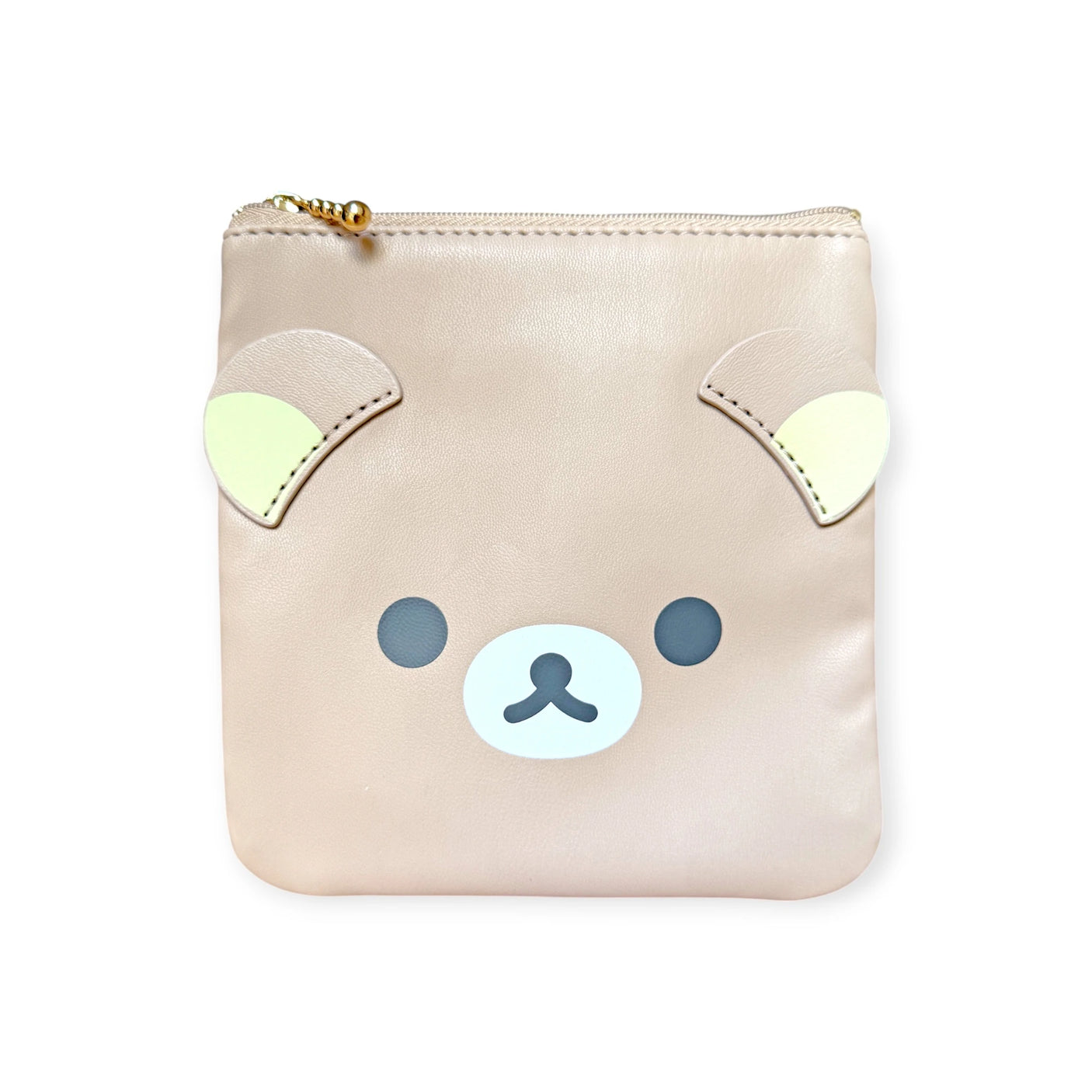 The Rilakkuma Flat Pouch - 15cm is a beige pouch featuring a bear face design, top zip closure, and side ears. It's spacious and versatile, ideal for stylishly storing essentials.