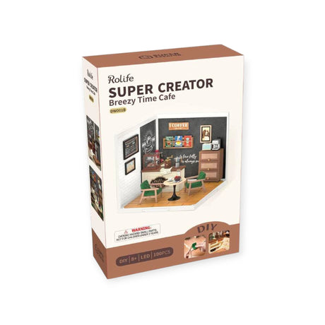 The Rolife Breezy Time Cafe - DIY Plastic Mini House features an illustrated miniature coffee shop on the box, includes 100 pieces, and is suitable for ages 8 and up.