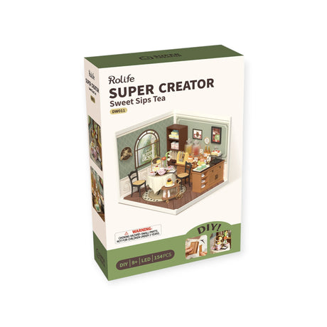 The Rolife Sweet Sips Tea Shop DIY kit by Rolife, designed for ages 8 and up, includes 154 pieces and an LED-lit miniature tea shop with a charming mini figure.