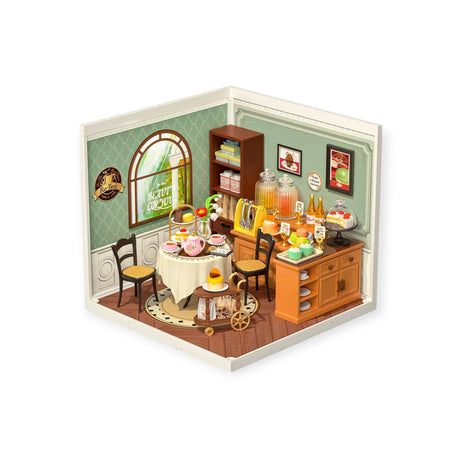 The Rolife Sweet Sips Tea Shop is a DIY plastic mini house resembling a cozy dining room with a round table, chairs, cabinets, fruit, and drinks. Windows and pictures adorn the walls, ideal for DIY enthusiasts or those who enjoy adding mini figures to their creations.