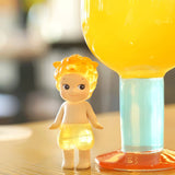 Sonny Angel yellow candy store keychain figurine with clear balloon-shaped base