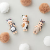 This Limited Edition display includes three Sonny Angel Cat Life Series figures dressed as animals, surrounded by white and brown fluffy balls.