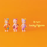 Three toy figures from the Sonny Angel Cat Life Series stand against an orange backdrop with the text "3 styles Lucky Figures." Dressed in vibrant animal-themed outfits, these limited edition figures by Sonny Angel add a playful touch to any collection.