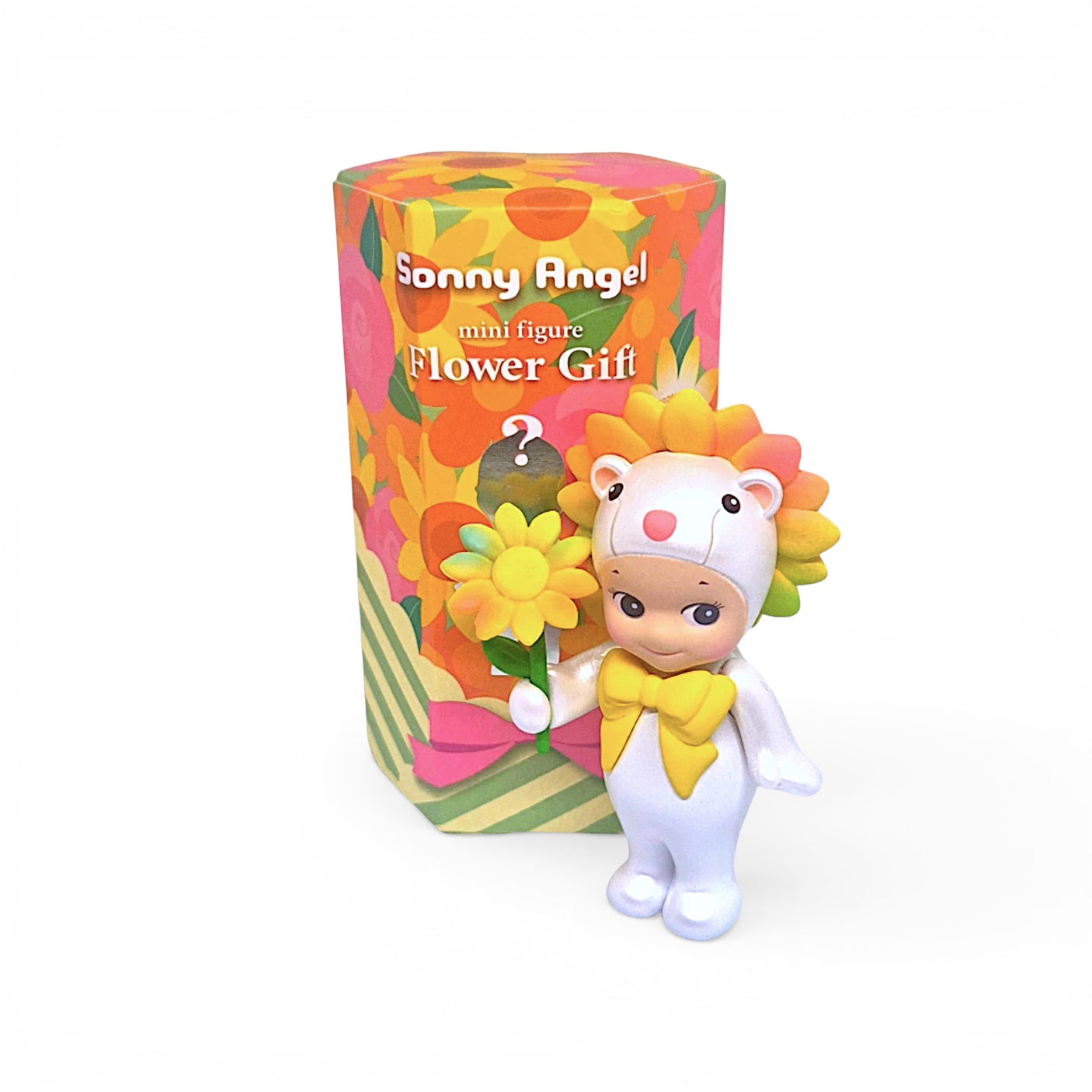 Flower Gift mini figure with yellow bow and orange flower, beside colorful gift box