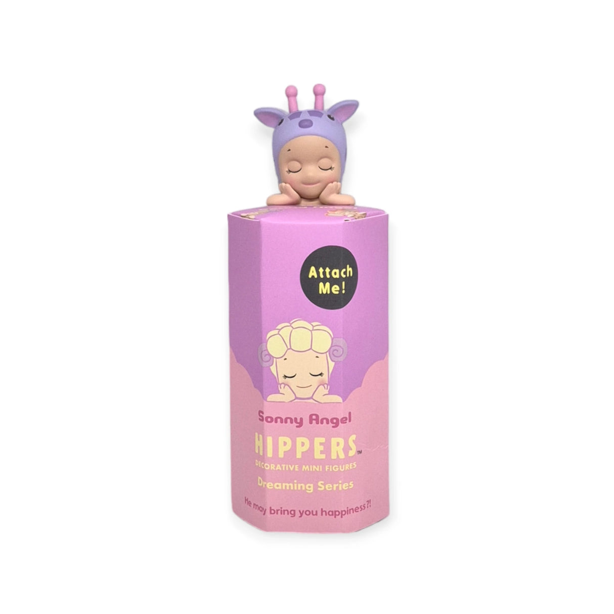 Atop a pink box, labeled "Sonny Angel Hippers Blind Box - Dreaming," rests a decorative mini figure with a sleepy expression, part of the enchanting Sonny Angel Dreamy Animal Collection.