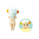 This Sonny Angel Hippers Blind Box - Animals figurine from Sonny Angel features cloud-like hair and orange horns, with its back facing forward. The inset highlights wide eyes and a gentle smile, all held securely in place with reusable adhesive.