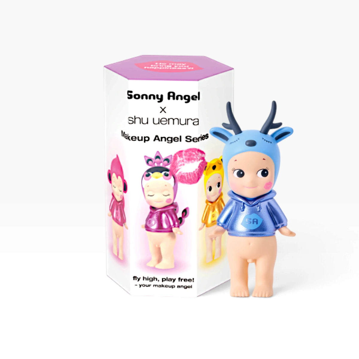 Makeup Angel blind box with blue bunny-capped figure in front of character packaging