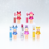Multiple Makeup Angel figures with lipstick tubes and small boxed accessories
