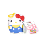 The Hello Kitty & Friends Keychains - Sanrio Characters features a Hello Kitty plush keychain, complete with a red bow and blue outfit, along with a branded tag. This charming accessory is ideal for any fan of Sanrio Merch and highlights the enduring appeal of Sanrio Characters.