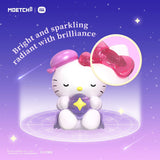 Two Hello Kitty mini astrology figures sitting with purple star accessory