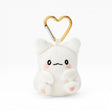 White plush keychain charm with gold heart clasp and smiling face, pink blush