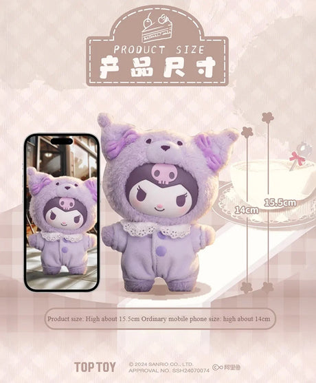 Small plush toy in a lavender animal costume with a skull emblem, standing next to a smartphone for size comparison