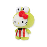 This charming Hello Kitty Plush, dressed in the Keroppi Costume, features a green frog hood with large round eyes and a red bow. Complete with a delightful red and white striped outfit and a black bow tie, it is an excellent addition for any Hello Kitty merchandise collector.