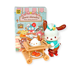 Figure of a dog character in a teal outfit pushing a wooden cart with steamed bun and croissants in front of a colorful backdrop