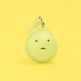 Light green Smiski strap keychain figure with metal clasp and key ring