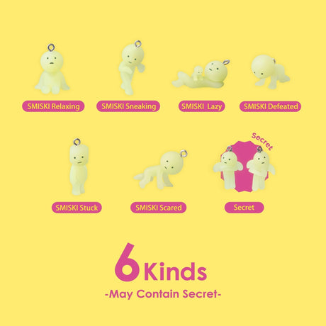 Smiski keychain display card showing six small figure poses with hanging tags