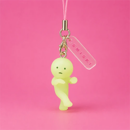 Smiski Sneaking figure from the Smiski Strap Accessory Keychain - Series 4 Lineup
