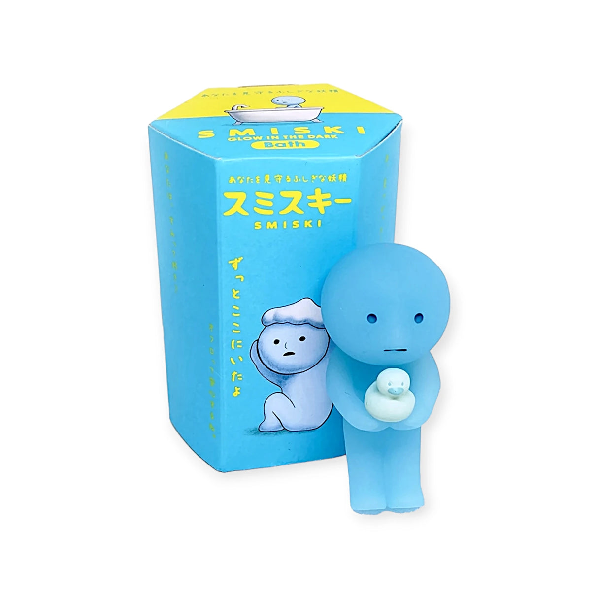 The Smiski Bath Series - Blind Box figure, from the Smiski brand, features a character gently holding a small duck and glowing subtly in the dark. It comes with matching blue packaging embellished with yellow text and illustrations, making it a charming addition to any collection of collectible figures.