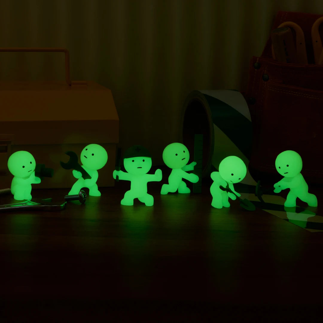 Smiski construction figures, neon green, group of small figures in different poses