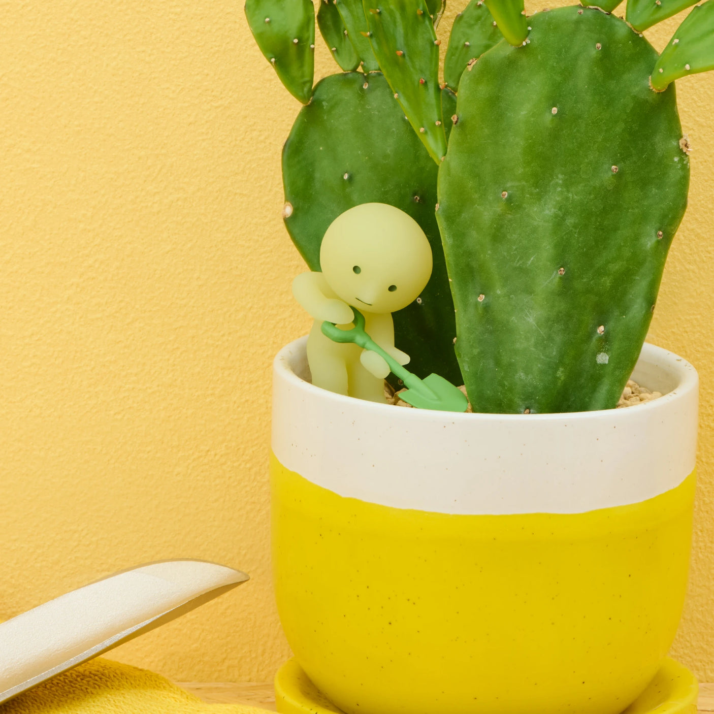 Smiski construction blind box figure with small cactus in white-yellow pot