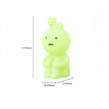 The Smiski Touch Light by Smiski includes a glowing green figure with a cat on its head, making it an ideal nightlight. It has dimensions of 173mm in height, 83mm in width, and 92mm in depth and is touch-activated for added convenience and charm.