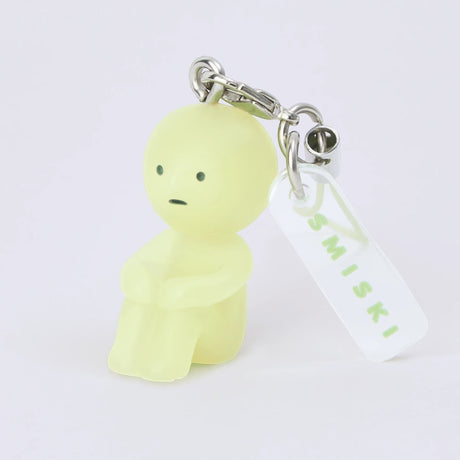 Pale green character keychain figure with metal key ring and white label tag