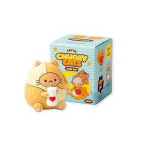 Smoko Tayto Chubby Cats Blind Box figure of a chubby cat holding a milk carton with heart, next to product packaging.