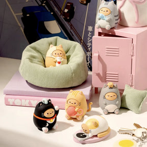Smoko Tayto Chubby Cats Blind Box figures in various poses with soft pastel props and a miniature pink locker.