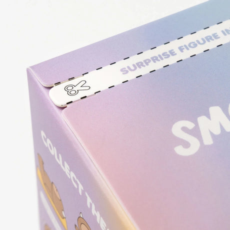 Close-up of pastel purple and blue Smoko Hank Yeti Doing Yoga blind box corner with tear strip visible