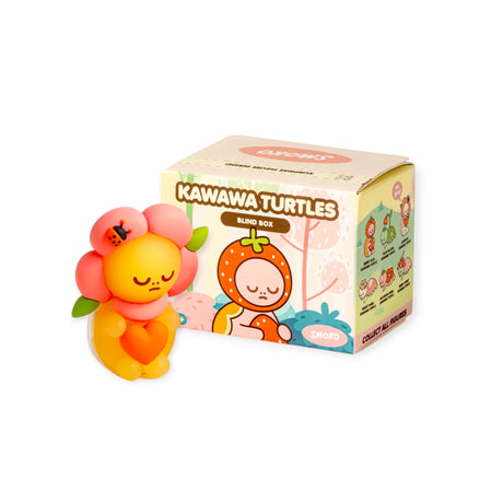 Yellow and pink sleepy Smoko Kawawa Turtle figure with ladybug on head next to a Kawawa Turtles blind box package