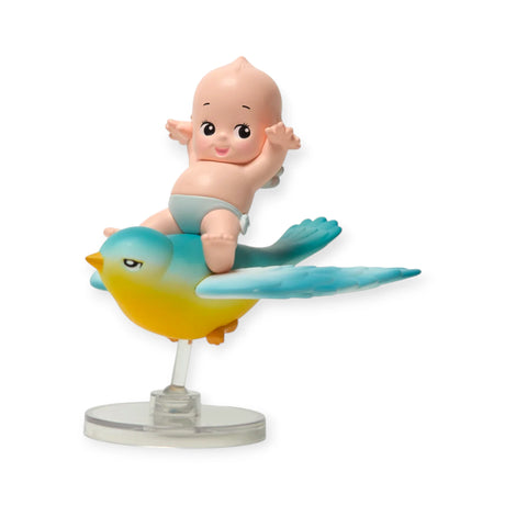 Kewpie blind box figurine: baby riding yellow-green fish with teal tail