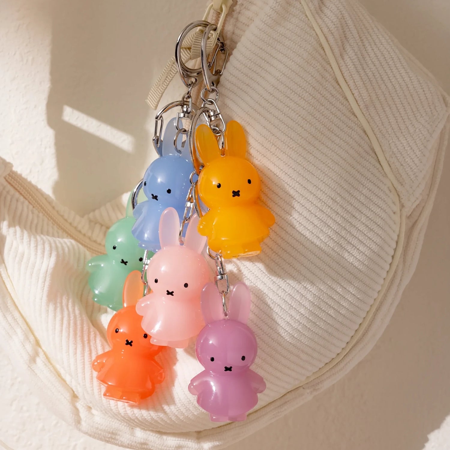 Pastel jelly rabbit keychains on metal rings, multicolor dangling rabbit charms