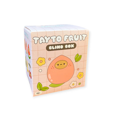 The Smoko Tayto Fruit Blind Box features a pastel design with a cute peach cartoon, yellow flowers, and hints of collectible Smoko Tayto Vinyl Figures on a light grid background.
