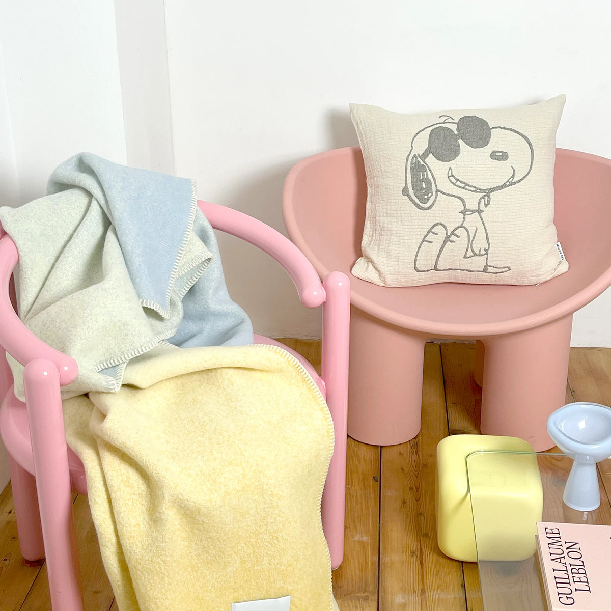 Cream cotton cushion cover with Snoopy holding headphones graphic