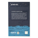 Peanuts NASA history pin backer card with dark grid and blue space illustration