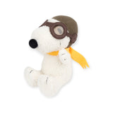 The Snoopy Plush Flying Ace - 18cm by Snoopy features aviator goggles and a yellow scarf, making it an ideal Peanuts gift.