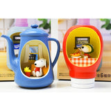 Miniature blue teapot and red bottle cap scenes featuring Snoopy and Woodstock in cozy diner settings